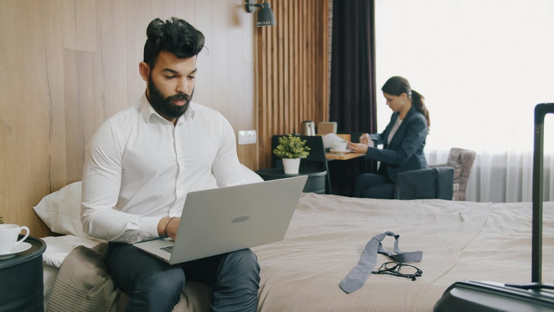 Business traveler using a laptop at a hotel during a Da Nang work trip
