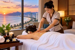 Professional wellness massage in a private holiday villa overlooking Da Nang beach at sunset